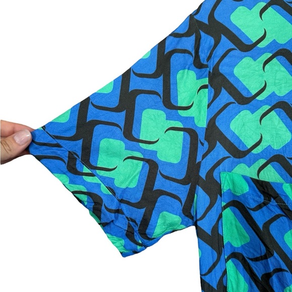 adL Blue, Green, Black Patterned Jumpsuit Romper with Cinched Waist and Collar. - Picture 3 of 8